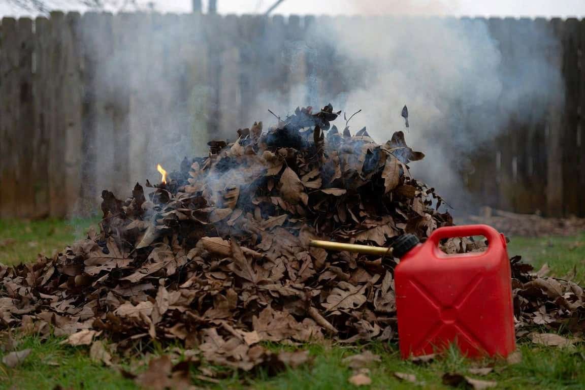 Gasoline poured on a wet pile of leaves: one weak flame and a lot of smoke